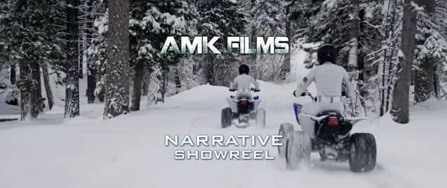 Snowy forest with two riders on ATVs, trees on either side; AMK FILMS logo with narrative showreel text