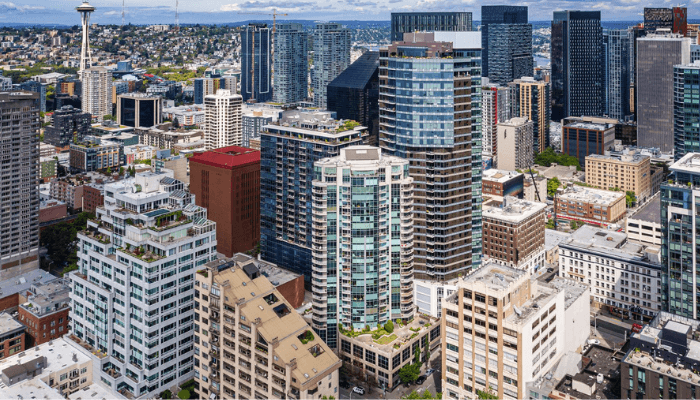 Aerial view of downtown skyline with glass high-rise buildings; Space Needle on the left